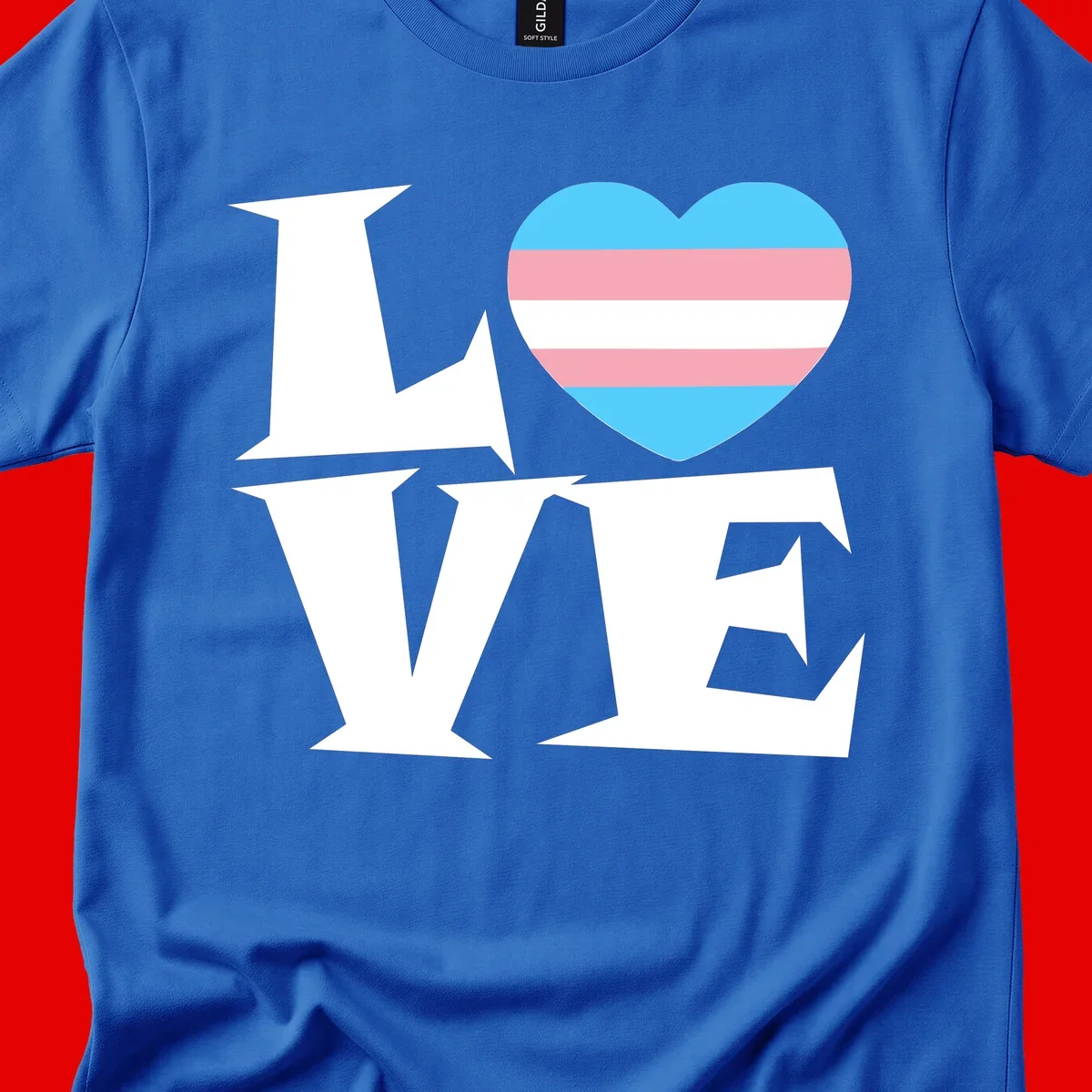 Trans pride heart with cyan, pink, and white stripes next to bold 'Love Wins' text on gray background