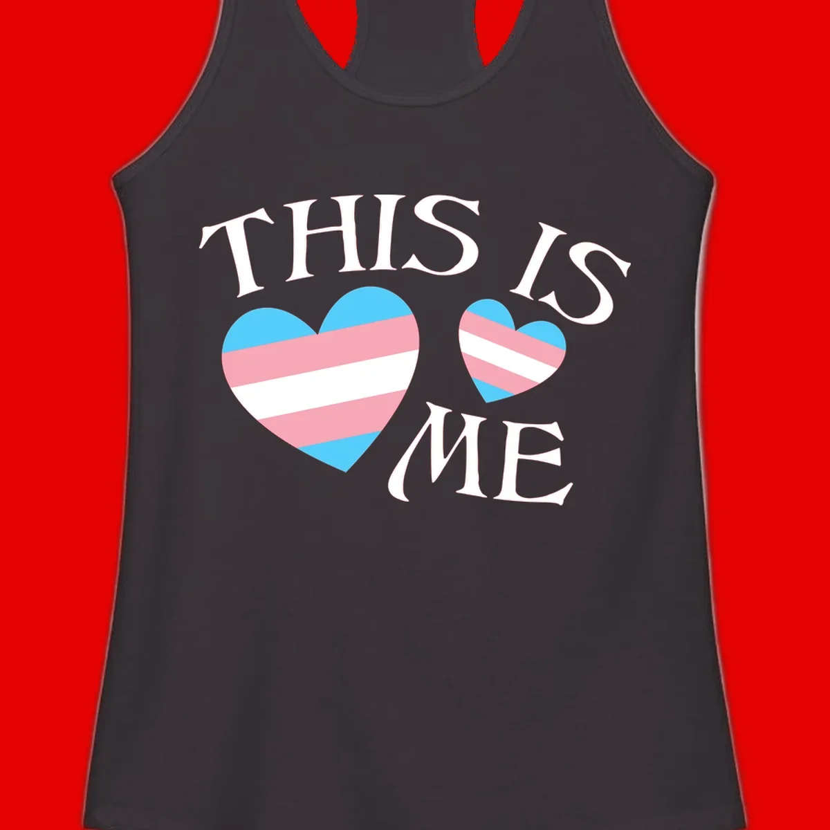 Two striped hearts in trans flag colors (blue, pink, white) with 'THIS IS ME' text celebrating trans pride and identity