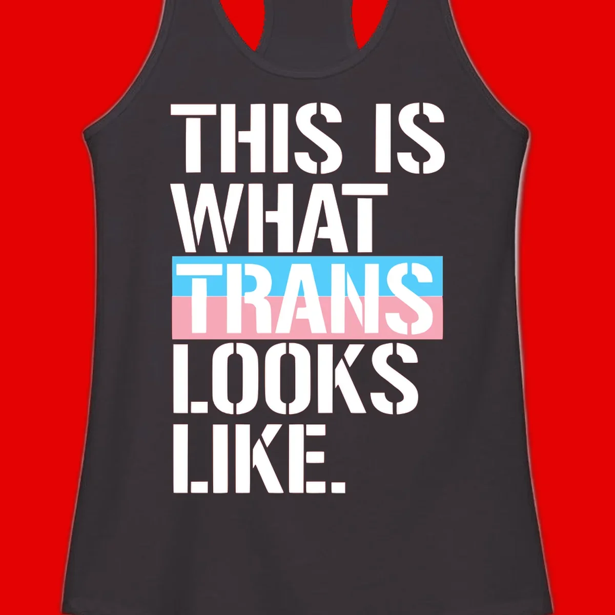 Bold typography design reading 'THIS IS WHAT TRANS LOOKS LIKE' with trans pride flag colors in blue and pink stripe
