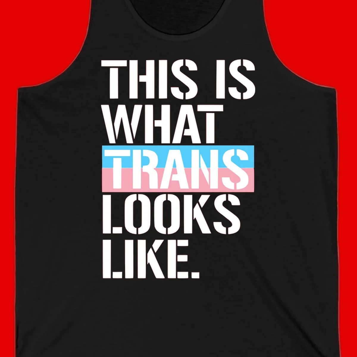Bold typography design reading 'THIS IS WHAT TRANS LOOKS LIKE' with trans pride flag colors in blue and pink stripe