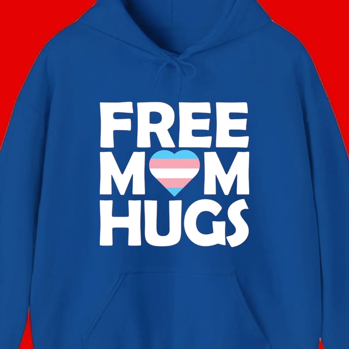 Free mom hugs pride design with striped heart in trans flag colors (blue, pink, white) and bold block lettering