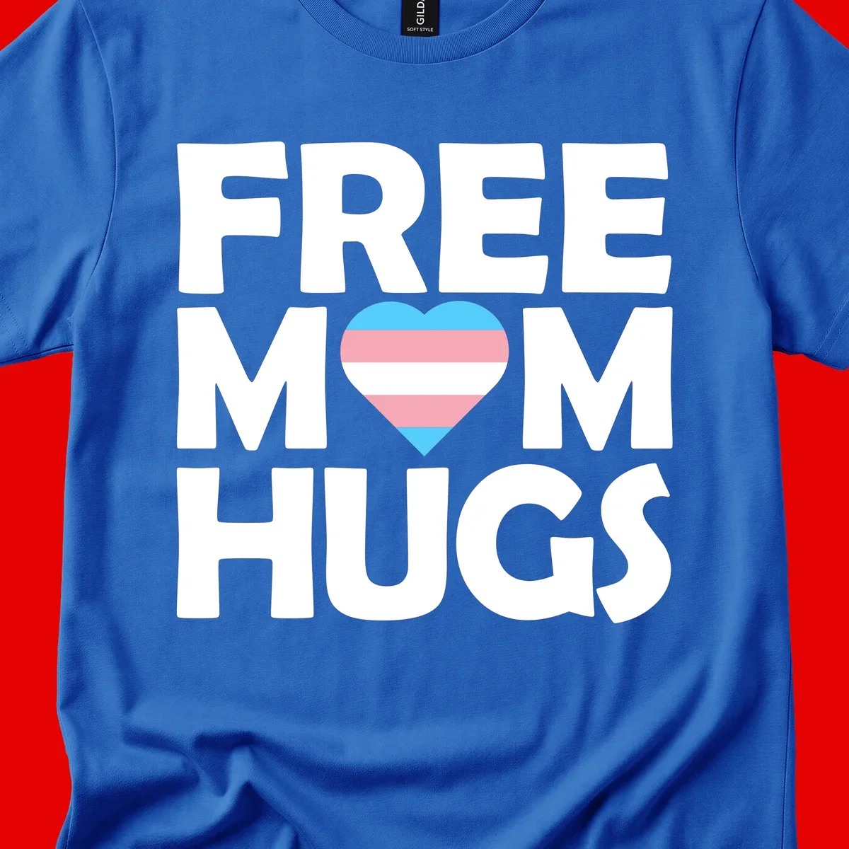 Free mom hugs pride design with striped heart in trans flag colors (blue, pink, white) and bold block lettering