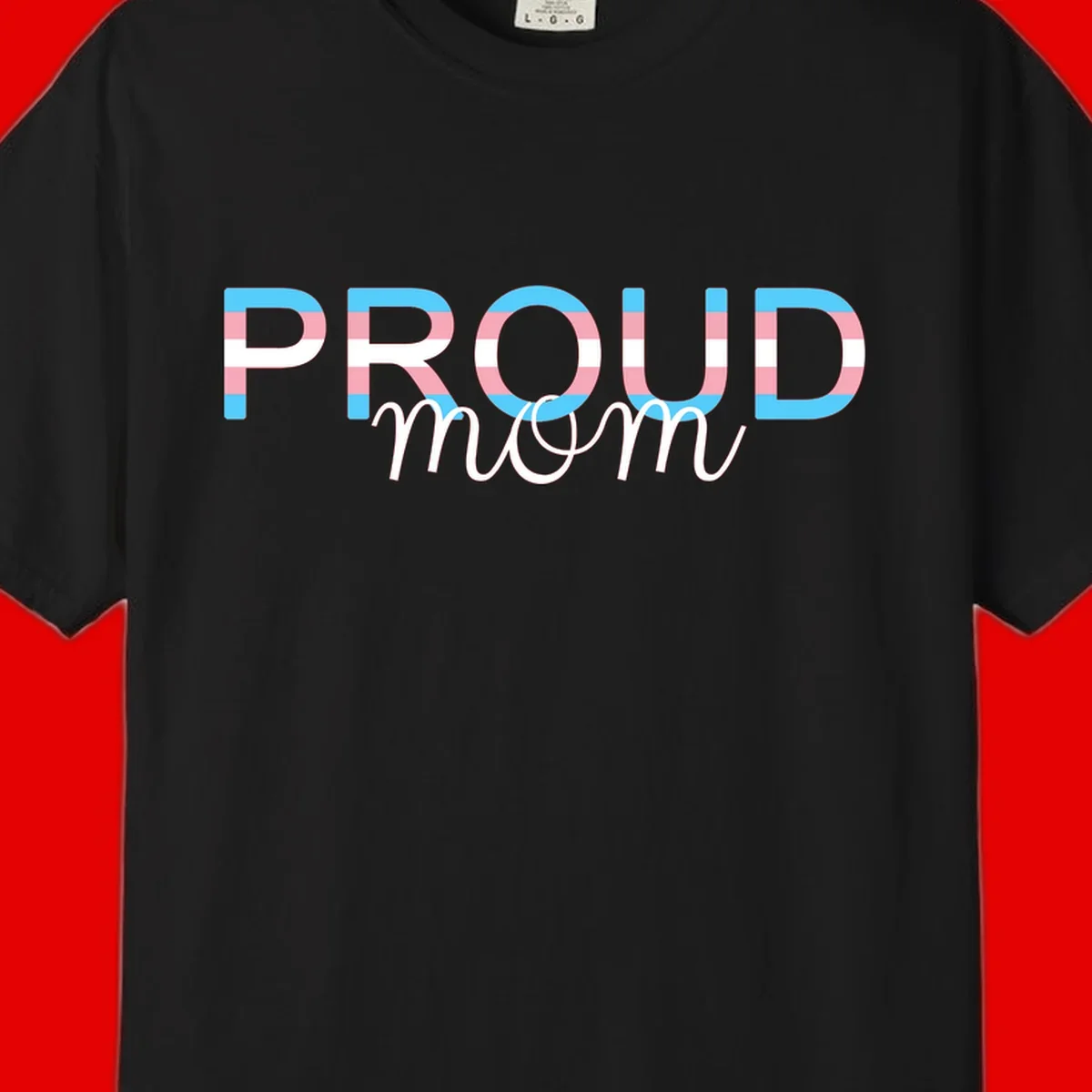 Proud mom pride design with bold striped rainbow letters in cyan, pink, and white on gray background