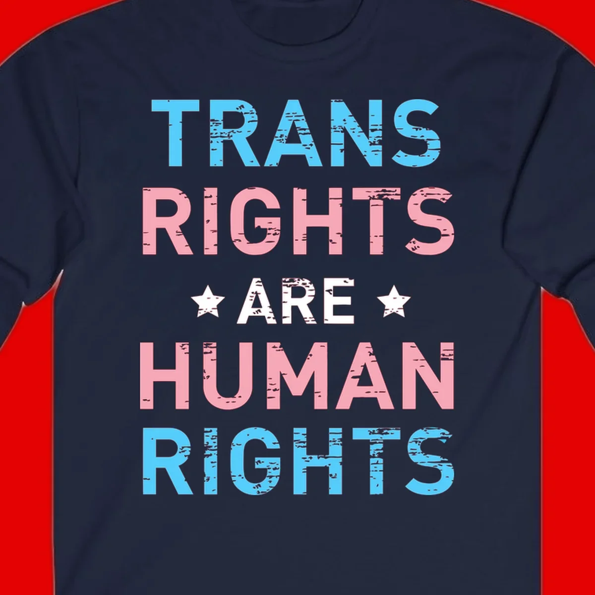 Distressed typography design reading 'TRANS RIGHTS ARE HUMAN RIGHTS' in cyan, pink, and white text with decorative stars on gray background