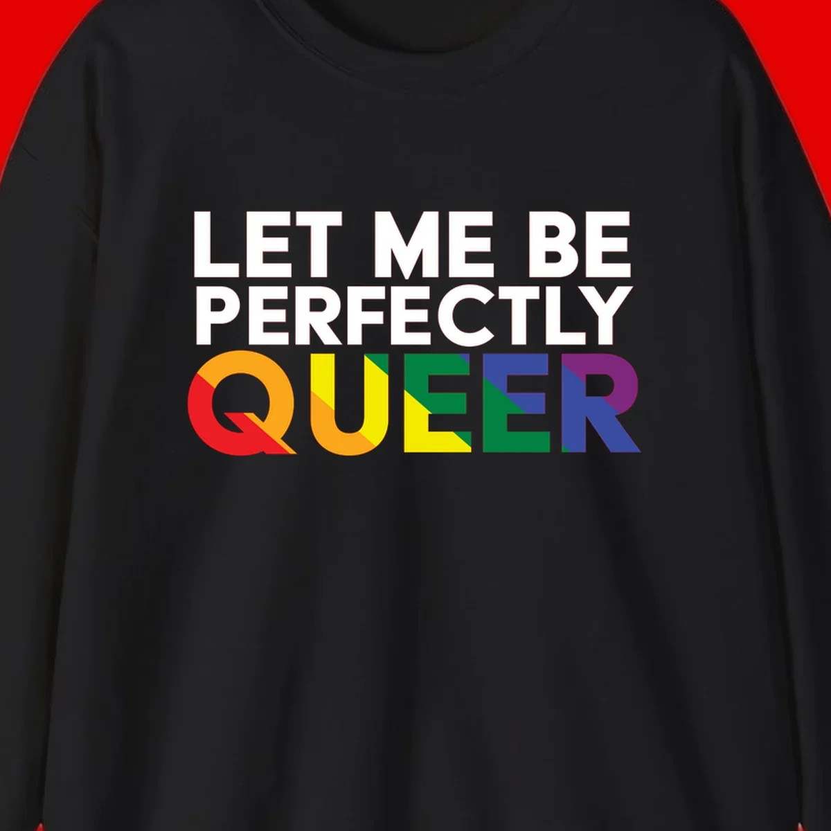 White text reading 'LET ME BE PERFECTLY QUEER' with the word QUEER in rainbow pride colors on gray background