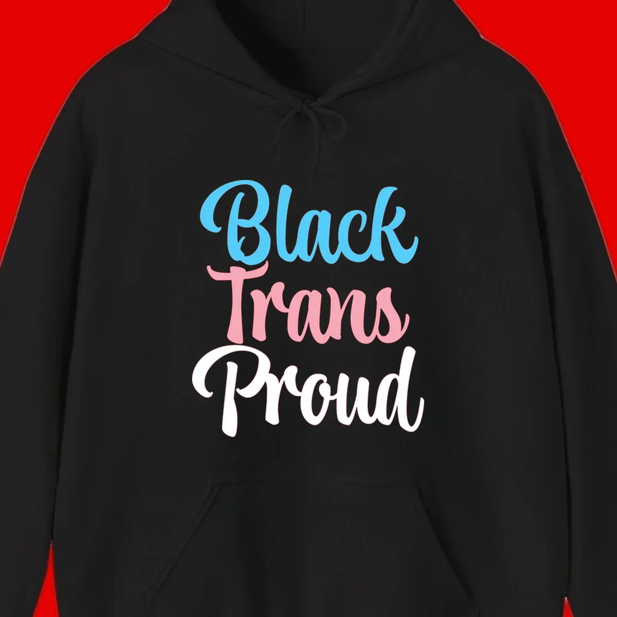 Block Trans Proud design with stacked text in cyan, pink, and white typography on gray background
