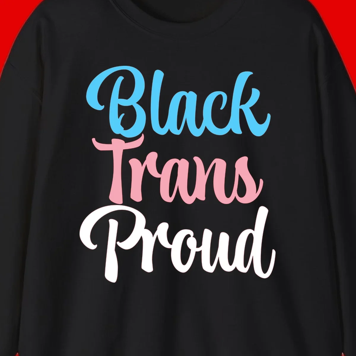 Block Trans Proud design with stacked text in cyan, pink, and white typography on gray background