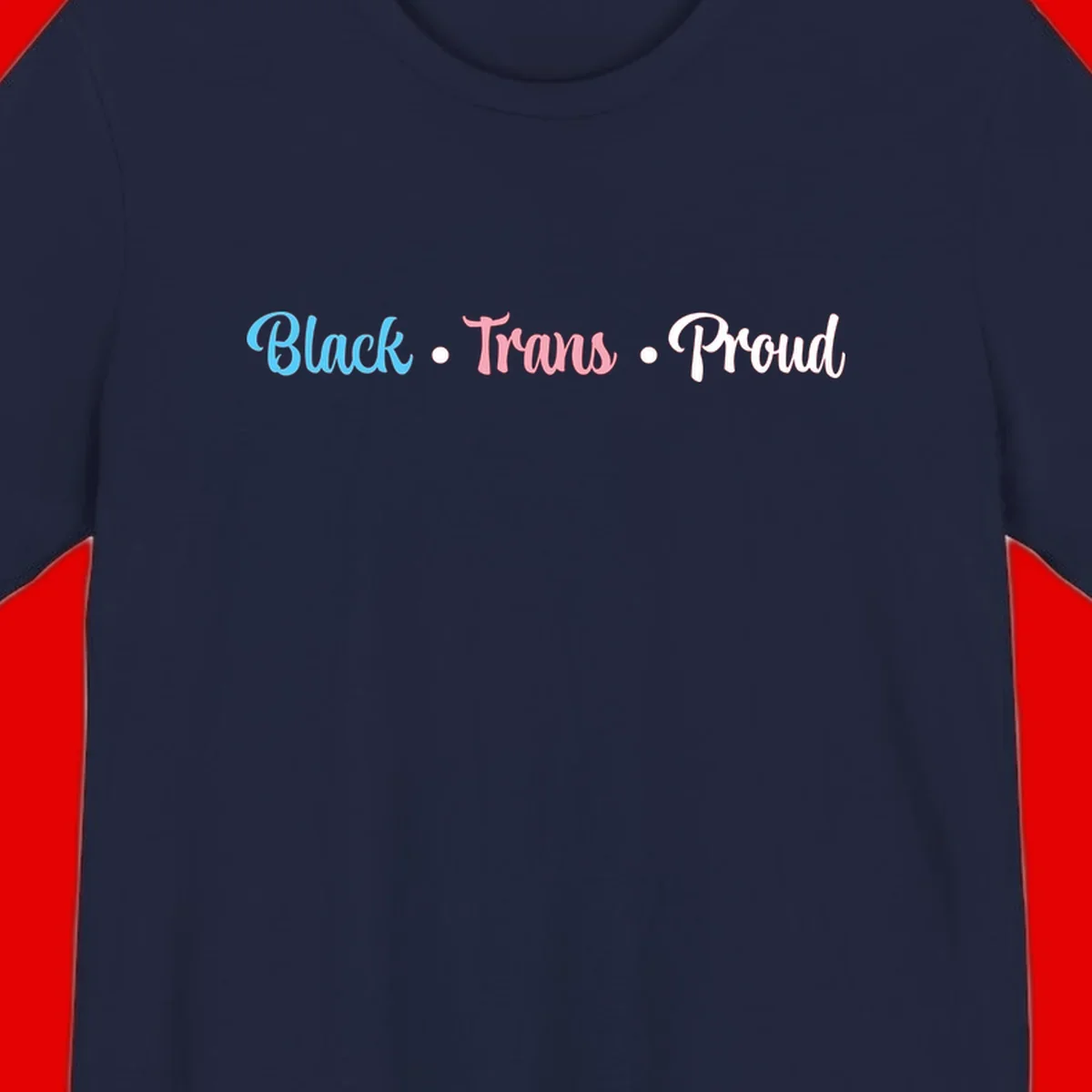 Black Trans Proud design with blue, pink, and white text on gray background, featuring decorative dots