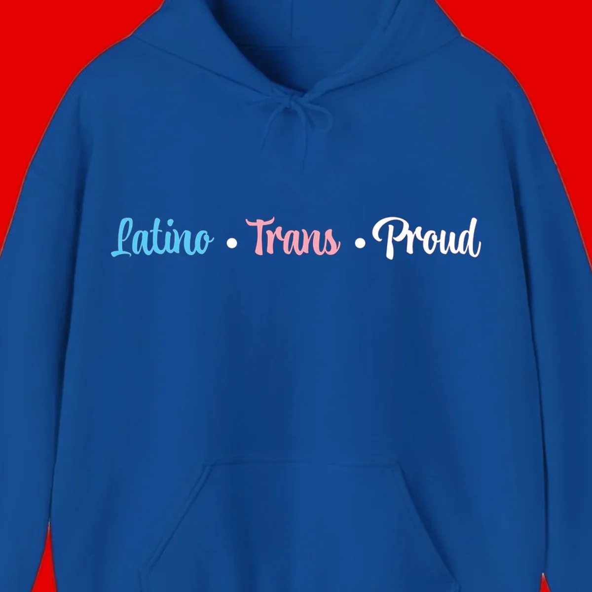 Latino Trans Proud design with blue, pink, and white script text on gray background celebrating LGBTQ identity