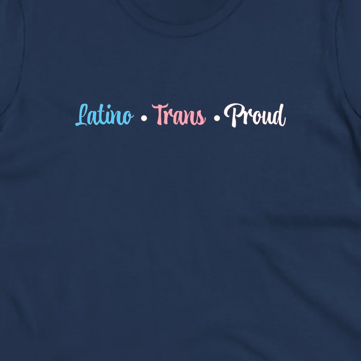 Latino Trans Proud design with blue, pink, and white script text on gray background celebrating LGBTQ identity