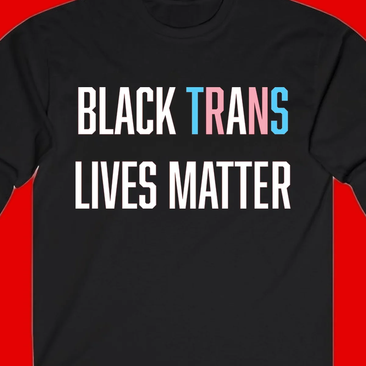 Bold typography design reading 'BLACK TRANS LIVES MATTER' with 'TRANS' in pink and cyan pride colors on gray background