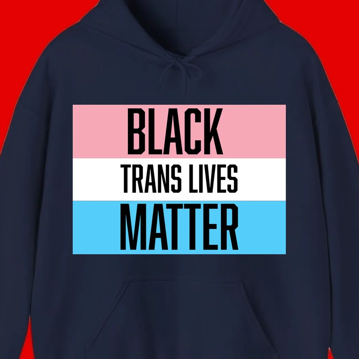 Black Trans Lives Matter design with bold text on trans pride flag colored horizontal stripes: pink, white, and blue