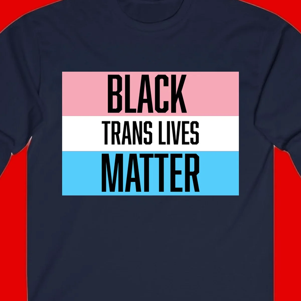 Black Trans Lives Matter design with bold text on trans pride flag colored horizontal stripes: pink, white, and blue