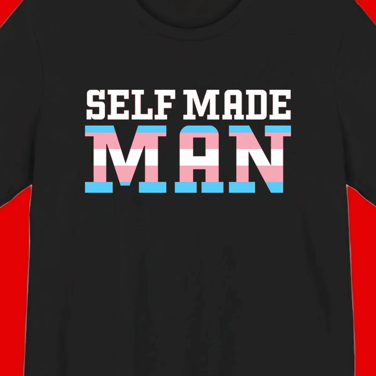 Bold 'Self Made' text filled with transgender pride flag stripes in blue, pink, and white on gray background