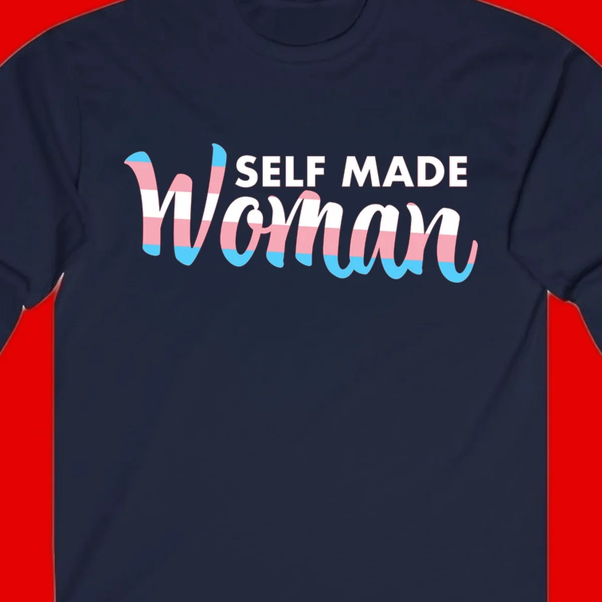 Self Made Woman design featuring bold wavy striped lettering in pink, white, and blue trans flag colors
