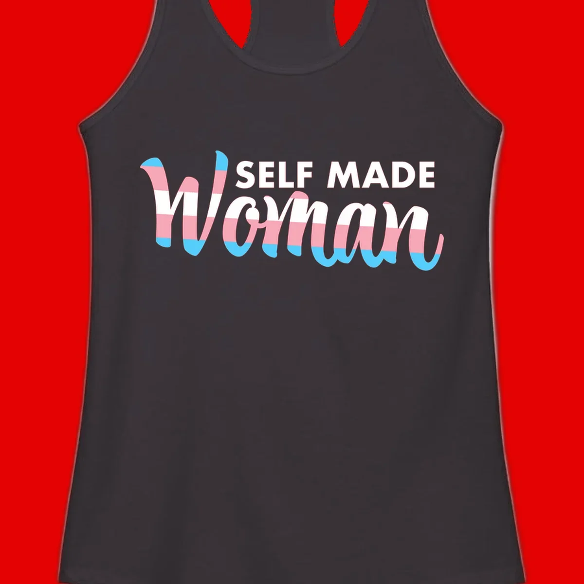 Self Made Woman design featuring bold wavy striped lettering in pink, white, and blue trans flag colors
