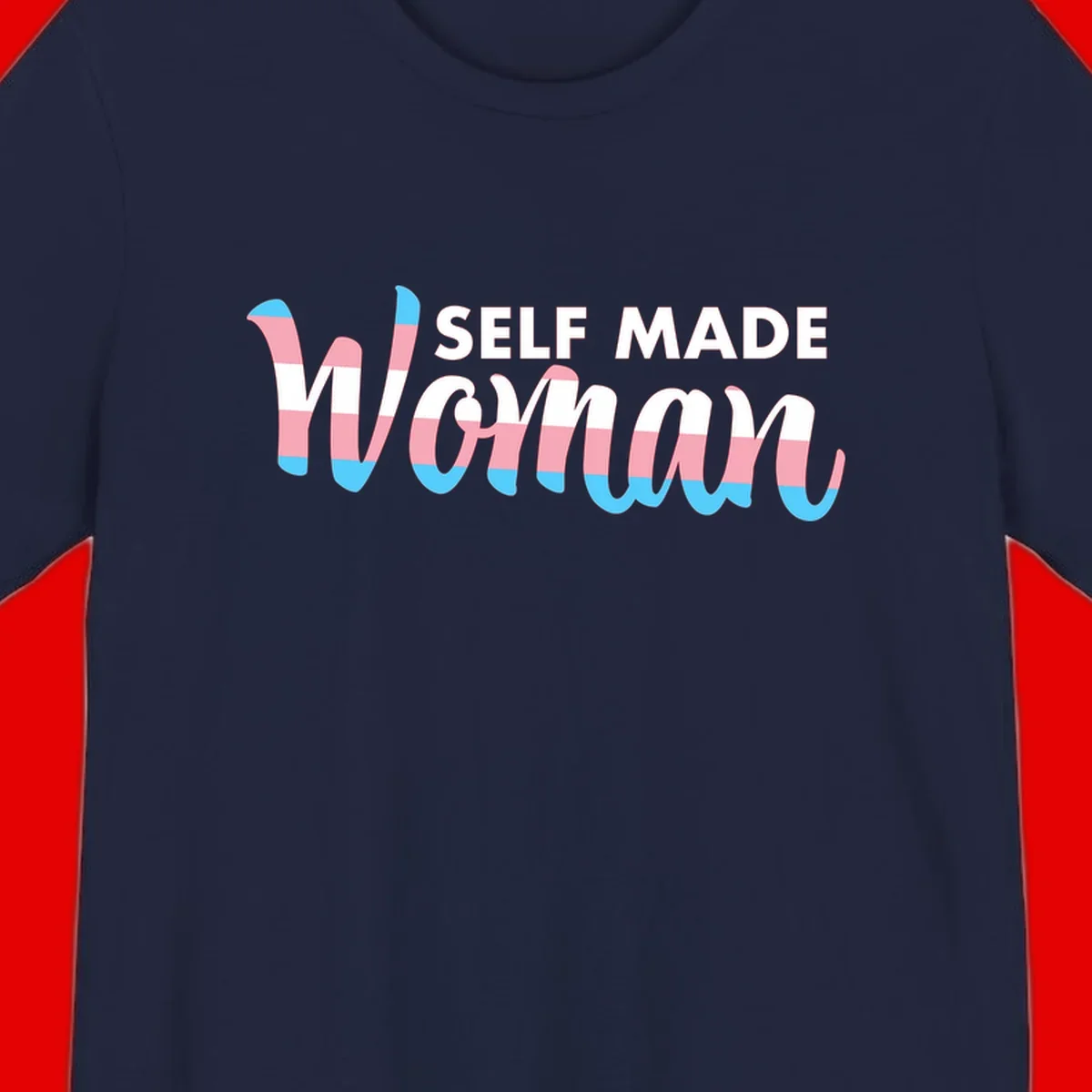 Self Made Woman design featuring bold wavy striped lettering in pink, white, and blue trans flag colors