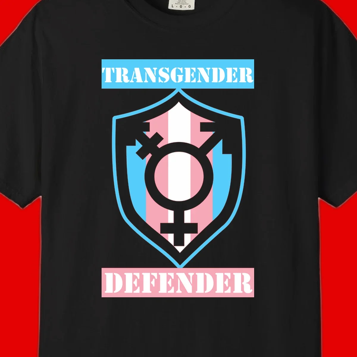 Transgender defender shield badge with centered symbol, protective arrows, and cyan-pink color scheme