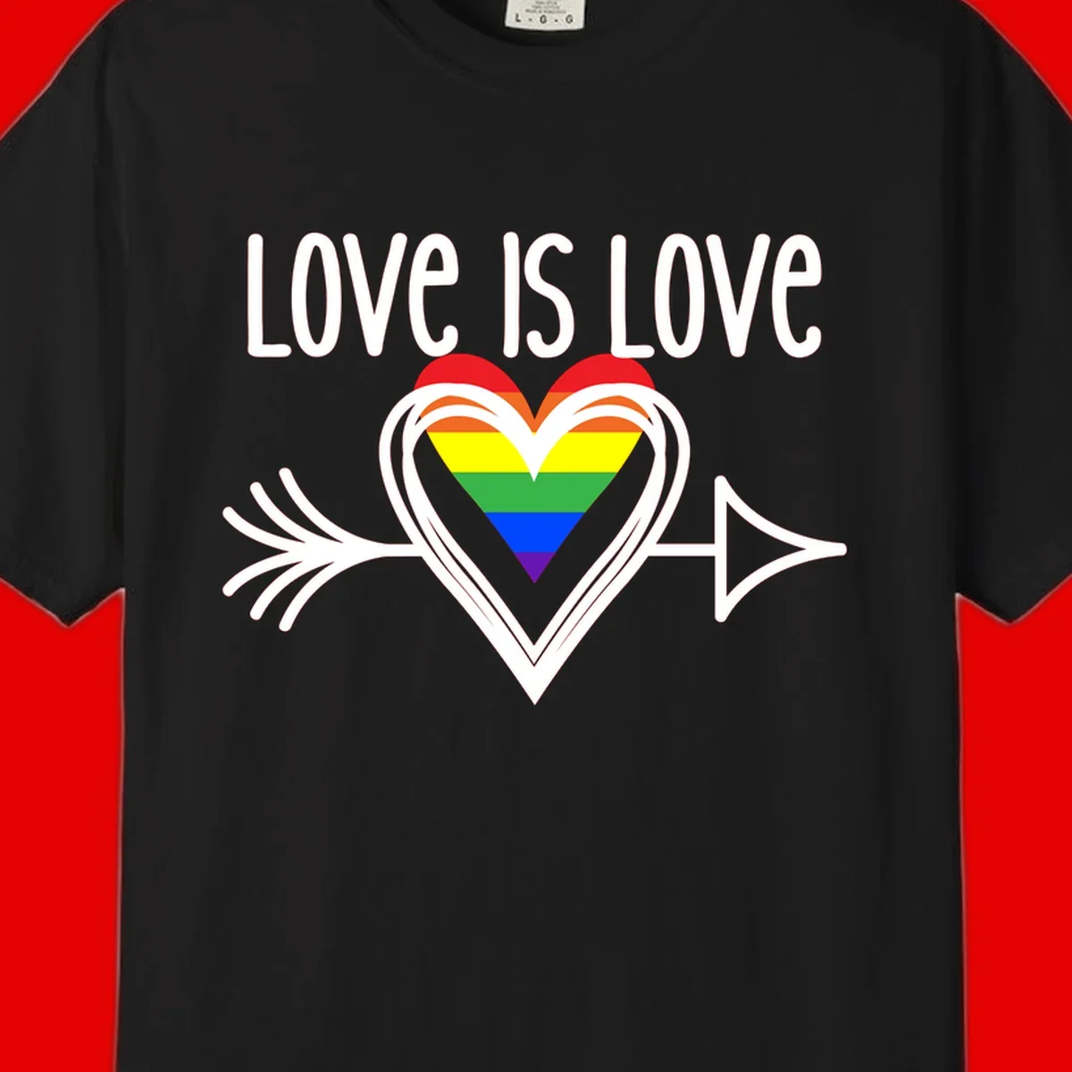 Love is love pride design featuring a white heart outline with rainbow-colored heart inside and decorative wing flourishes on gray background