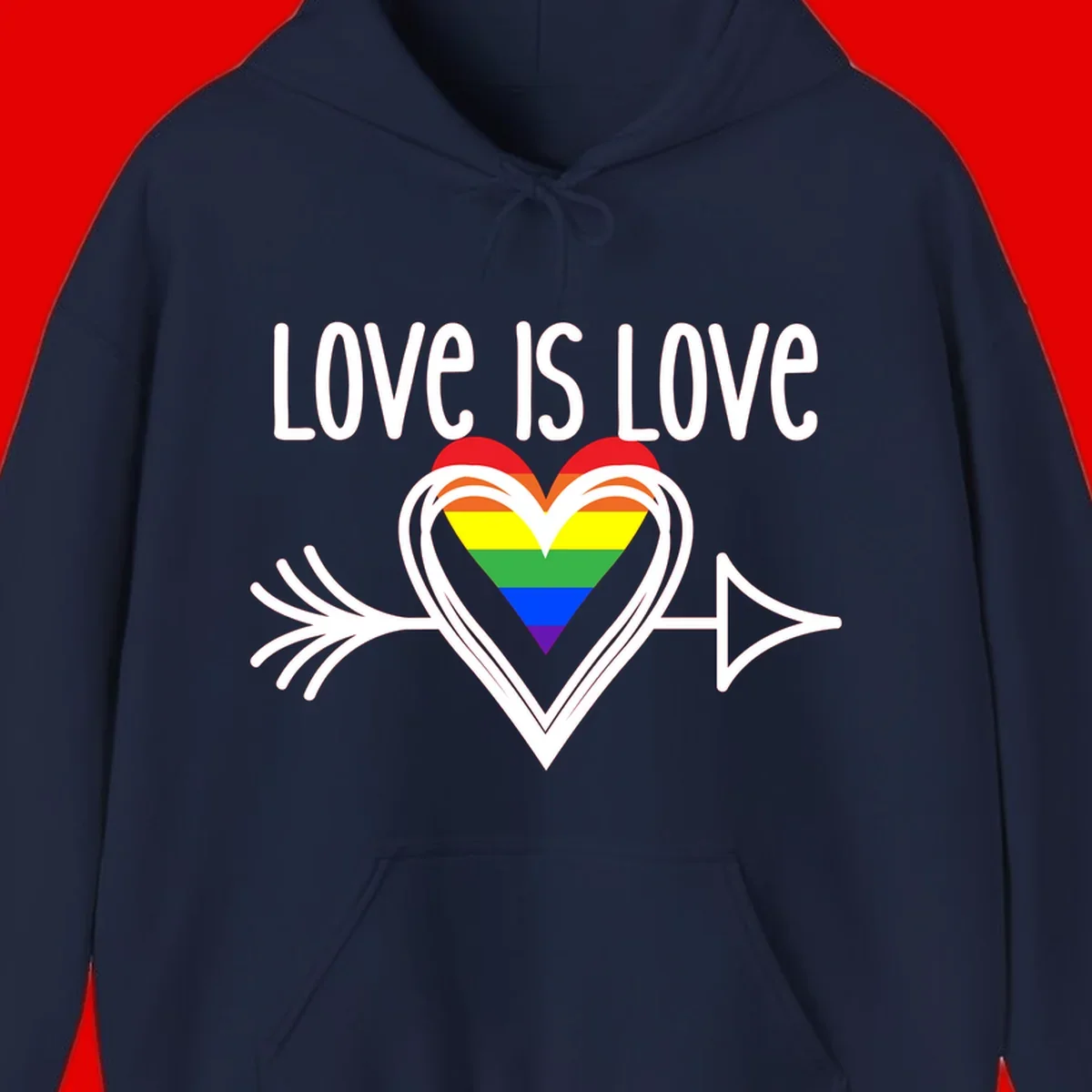 Love is love pride design featuring a white heart outline with rainbow-colored heart inside and decorative wing flourishes on gray background