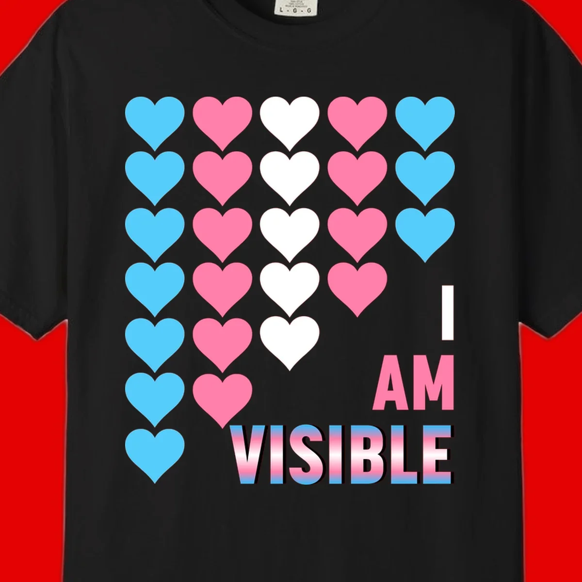 I Am Visible Pride design with repeating cyan, pink, and white hearts on gray background and gradient text message