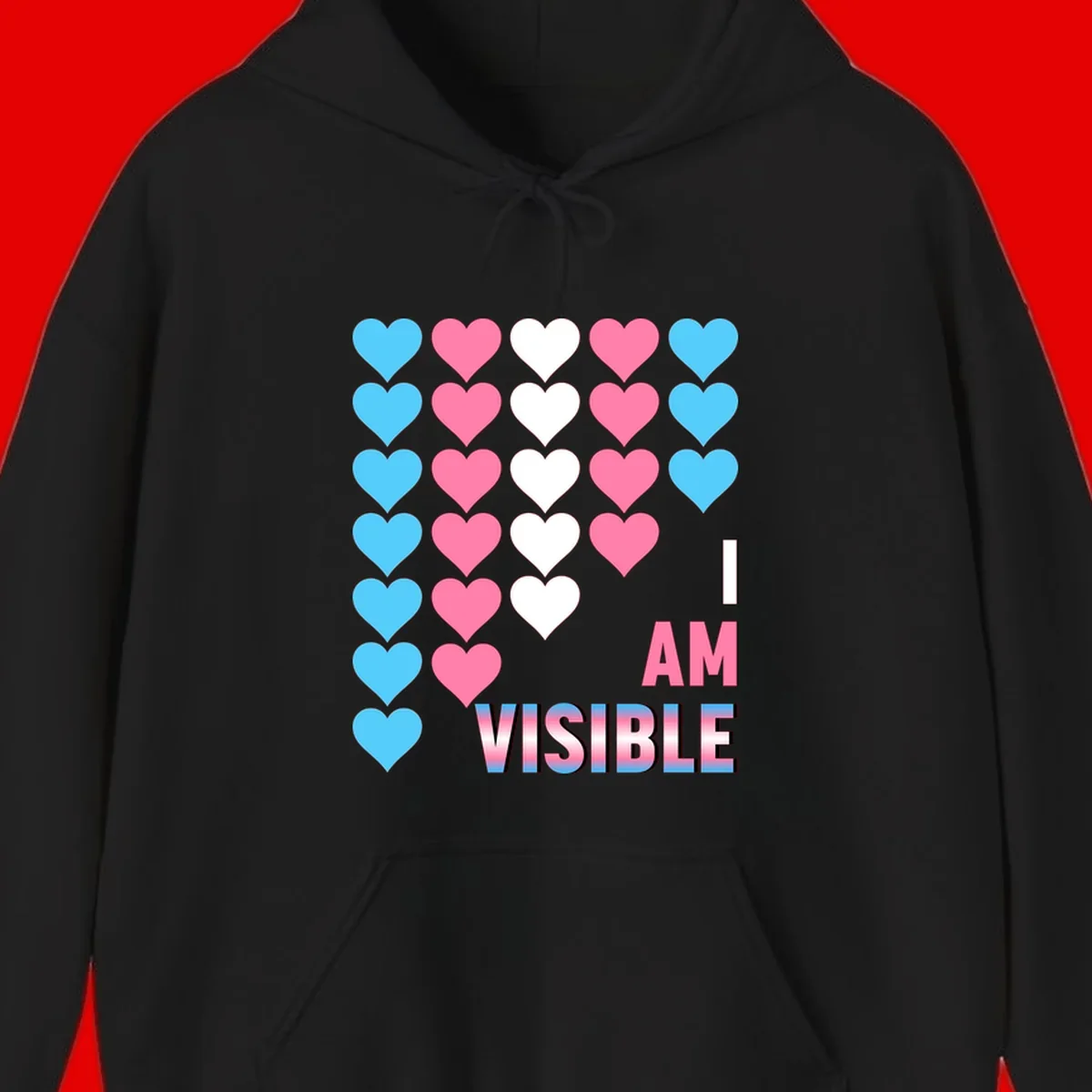 I Am Visible Pride design with repeating cyan, pink, and white hearts on gray background and gradient text message