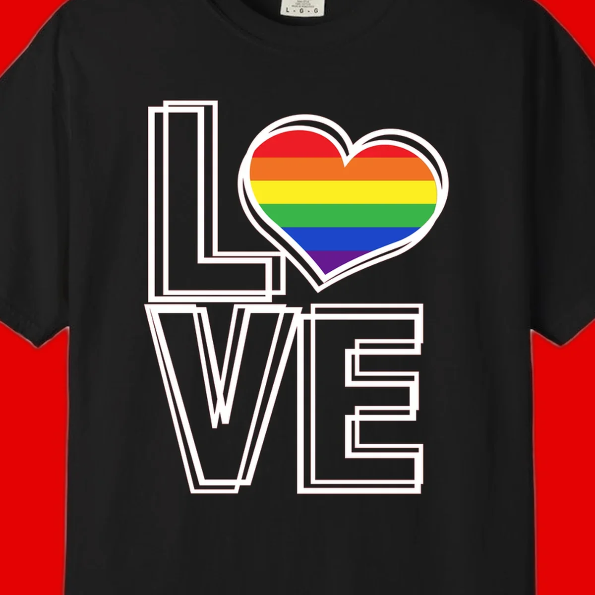 Love is love rainbow heart design with vibrant Pride flag colors in an outlined heart shape and bold LOVE text