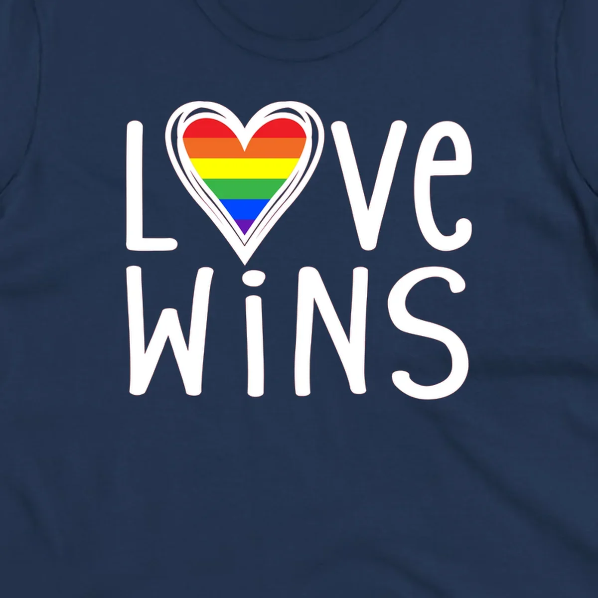 Love wins rainbow heart design with pride flag colors in white outlined heart shape and text