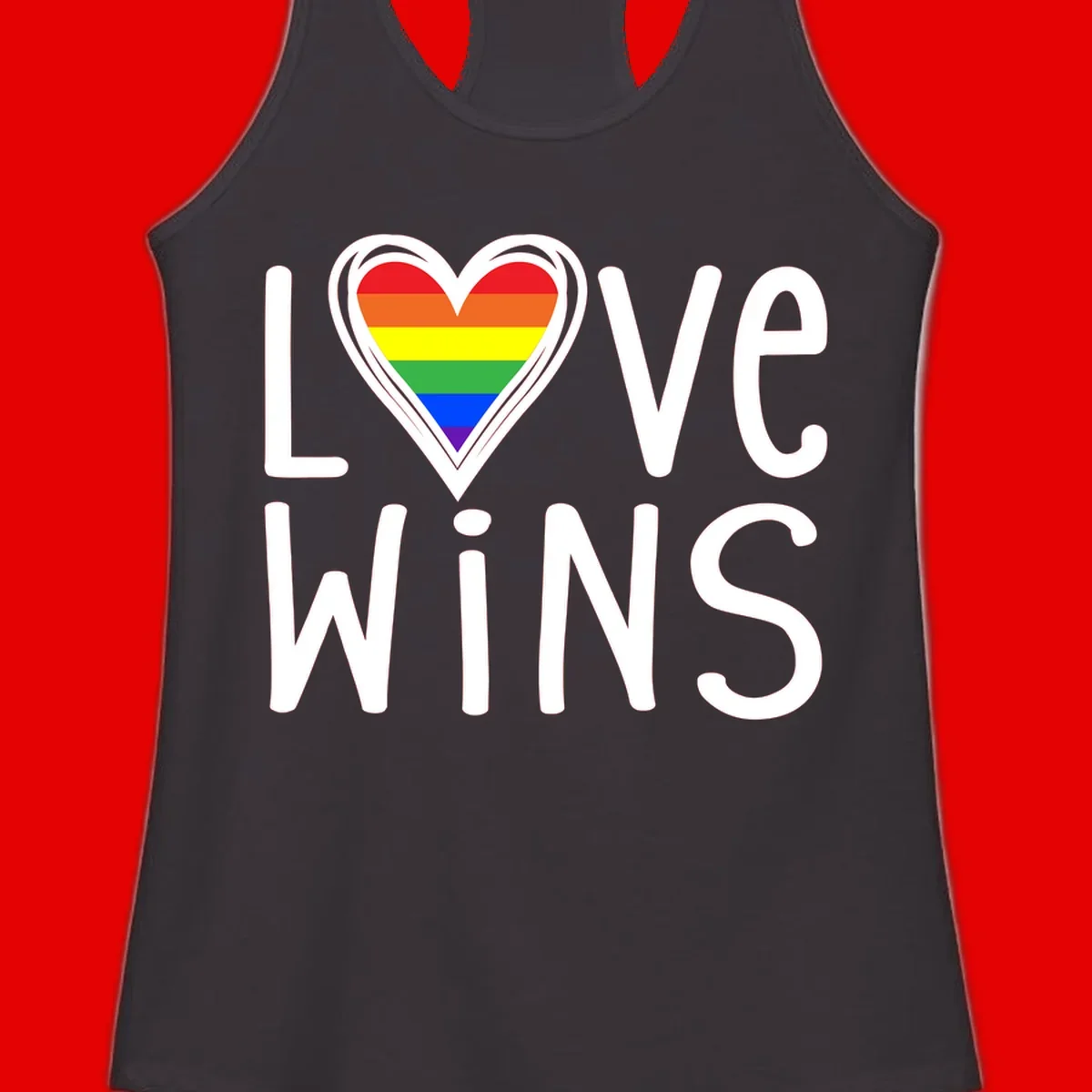 Love wins rainbow heart design with pride flag colors in white outlined heart shape and text