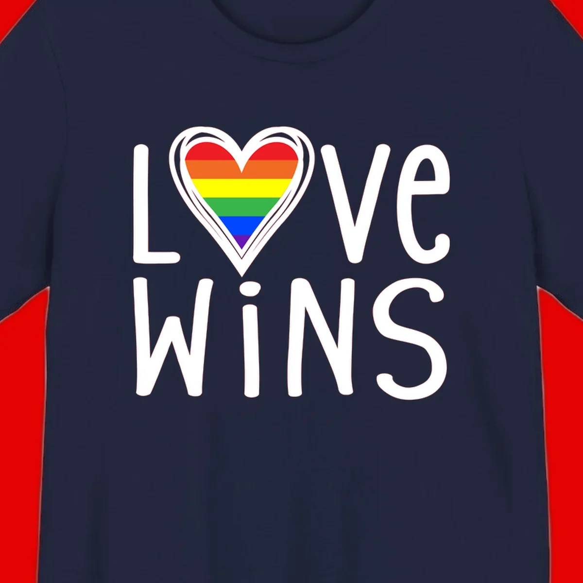 Love wins rainbow heart design with pride flag colors in white outlined heart shape and text