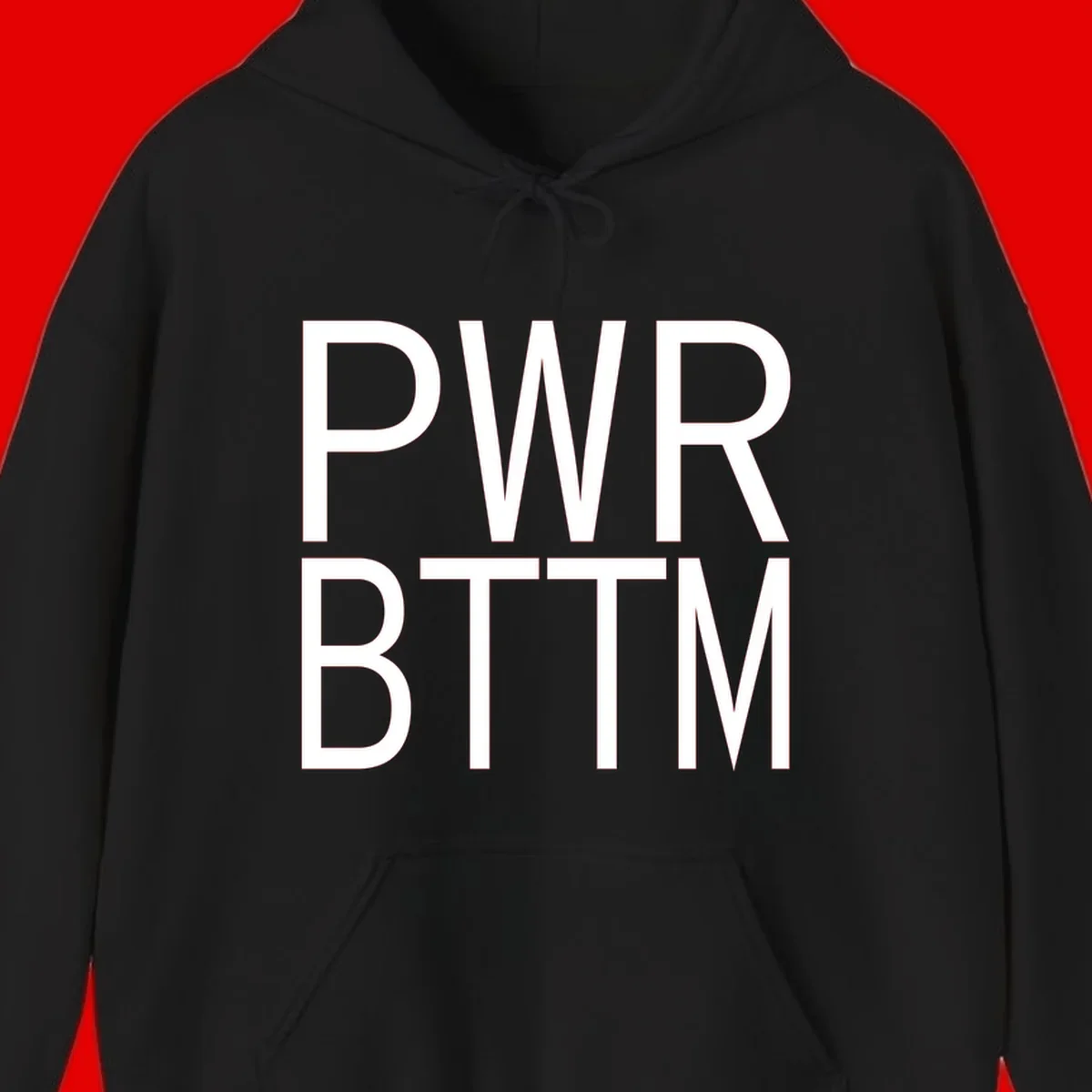 PWR BTTM pride shirt design with bold white sans-serif lettering stacked vertically on gray background