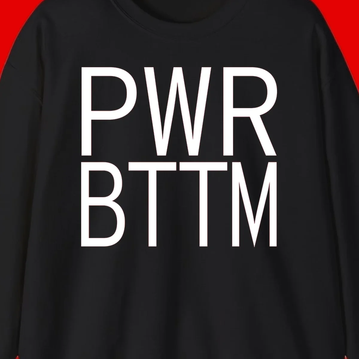 PWR BTTM pride shirt design with bold white sans-serif lettering stacked vertically on gray background