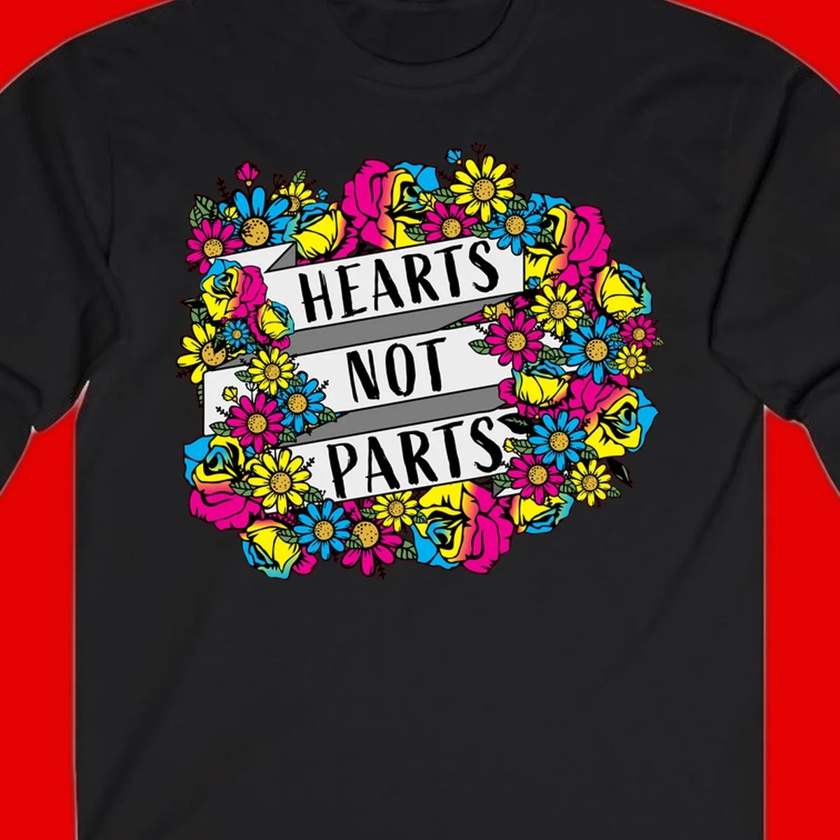 Hearts Not Parts pride design with colorful floral wreath featuring yellow daisies, magenta roses, and blue flowers surrounding bold statement text
