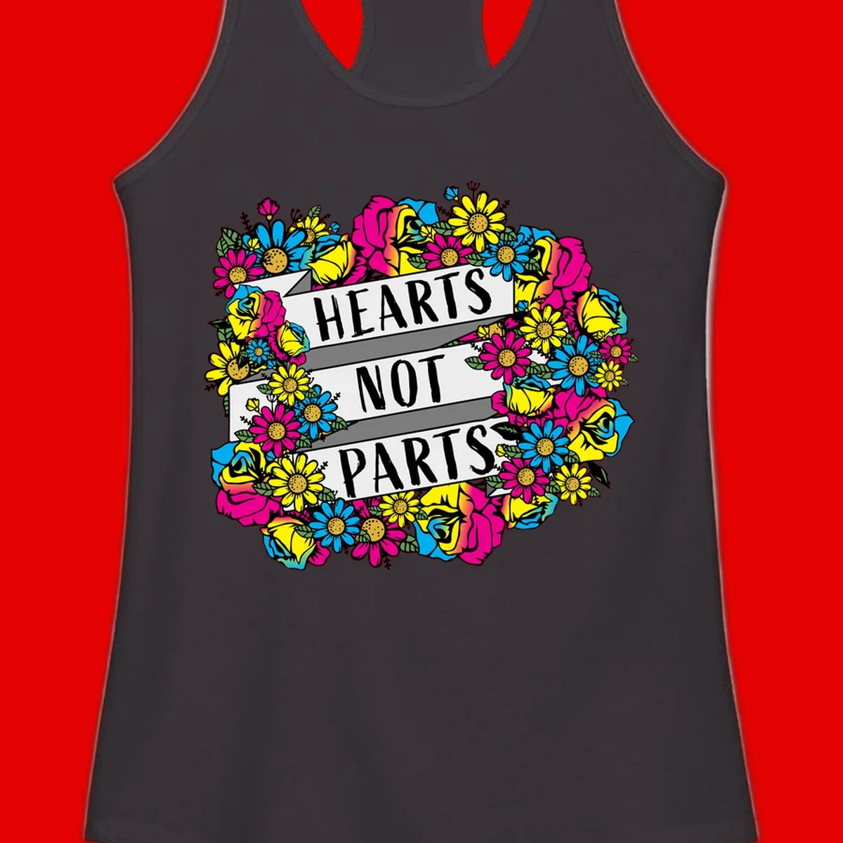Hearts Not Parts pride design with colorful floral wreath featuring yellow daisies, magenta roses, and blue flowers surrounding bold statement text