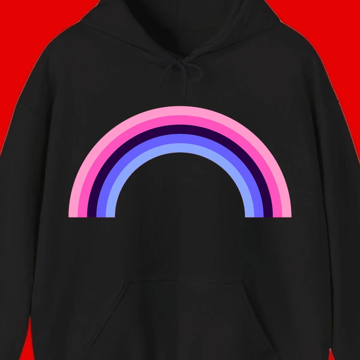 Pastel rainbow arc with five concentric colored stripes in pink, navy, blue and light blue on gray background