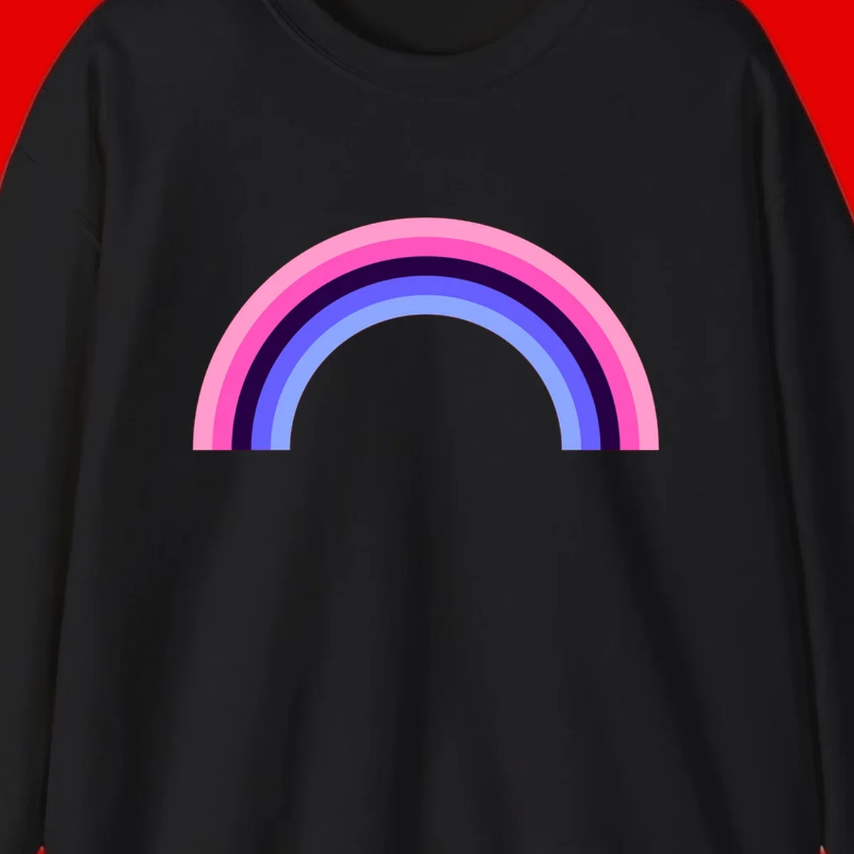 Pastel rainbow arc with five concentric colored stripes in pink, navy, blue and light blue on gray background