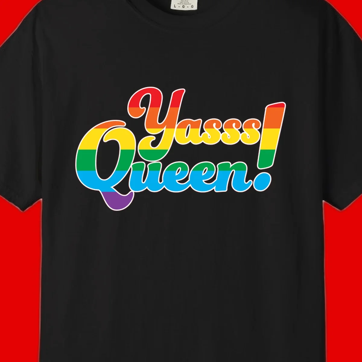 Rainbow pride flag striped text reading 'Unapologetically Queer!' with bold white outline on gray background