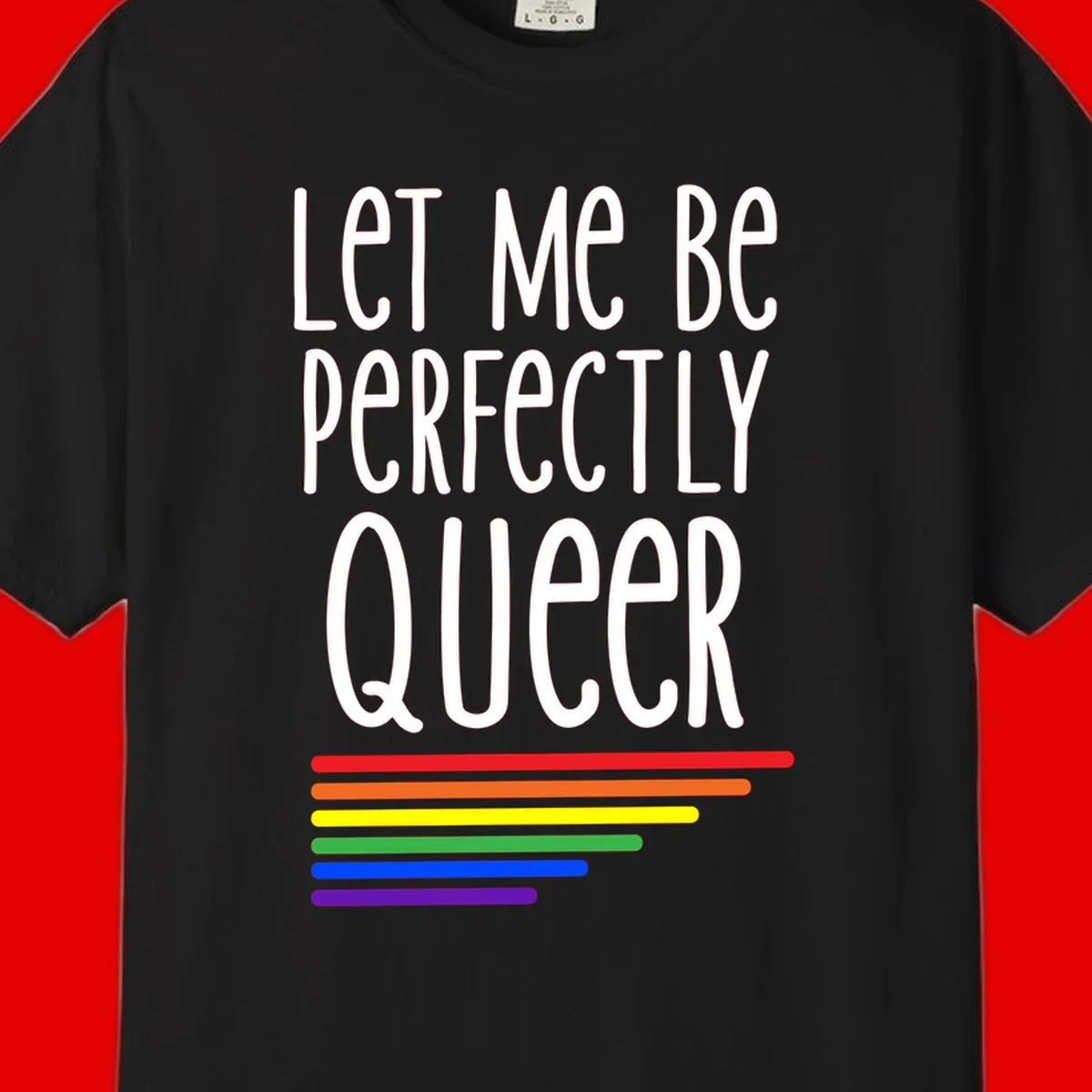 White text reading 'Let Me Be Perfectly Queer' on gray background with six rainbow pride stripes below