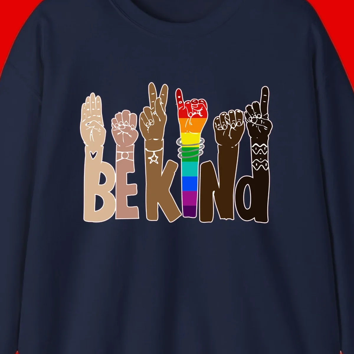 Six illustrated hands in diverse skin tones displaying peace signs and fists, with center fist in rainbow pride colors and 'BE KIND' text below
