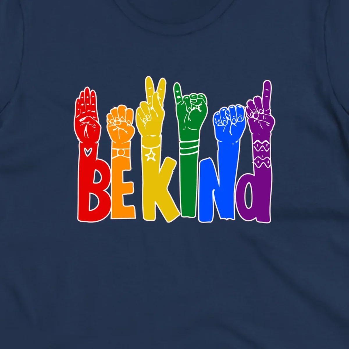 Six colorful raised fists in rainbow colors with 'BE KIND' text, promoting pride, equality, and inclusive messaging