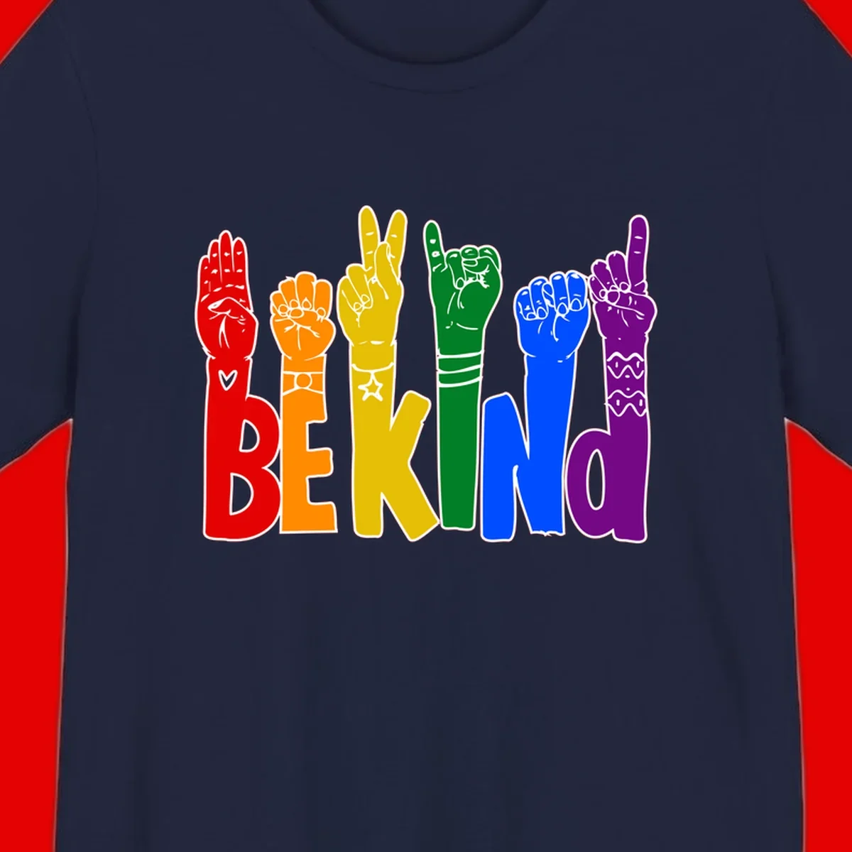 Six colorful raised fists in rainbow colors with 'BE KIND' text, promoting pride, equality, and inclusive messaging