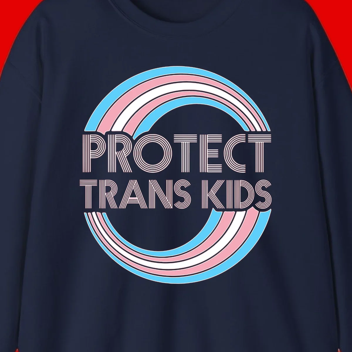 Protect trans kids pride design with blue, pink, and white rainbow circles and striped lettering
