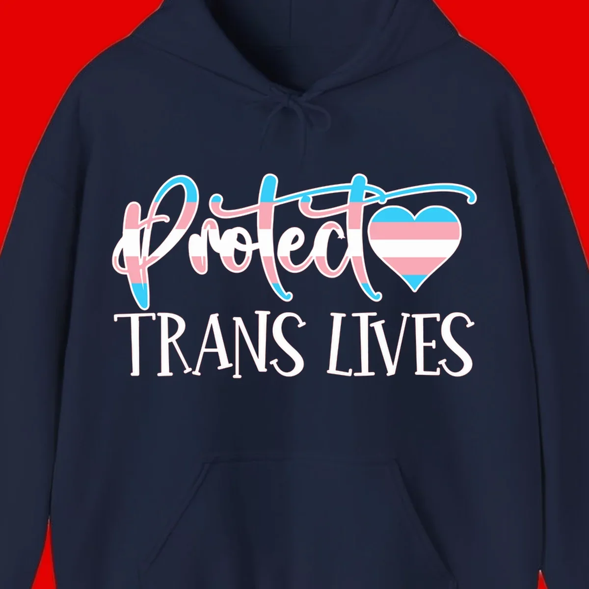 Stylized text 'I heart TRANS LIVES' with decorative letters and a trans flag-striped heart symbol in pink, white, and blue colors