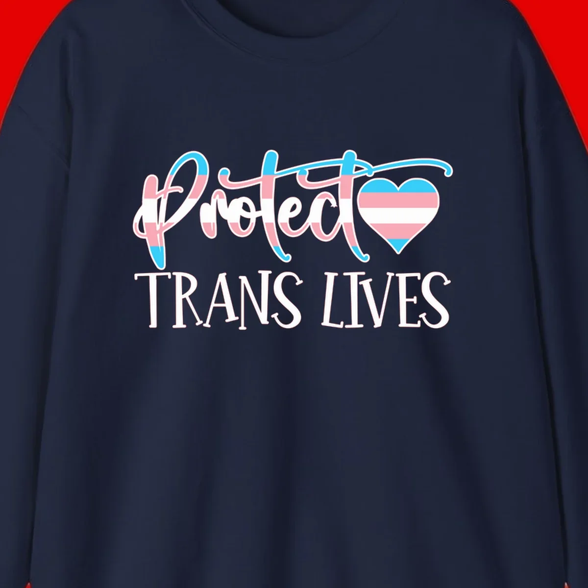Stylized text 'I heart TRANS LIVES' with decorative letters and a trans flag-striped heart symbol in pink, white, and blue colors