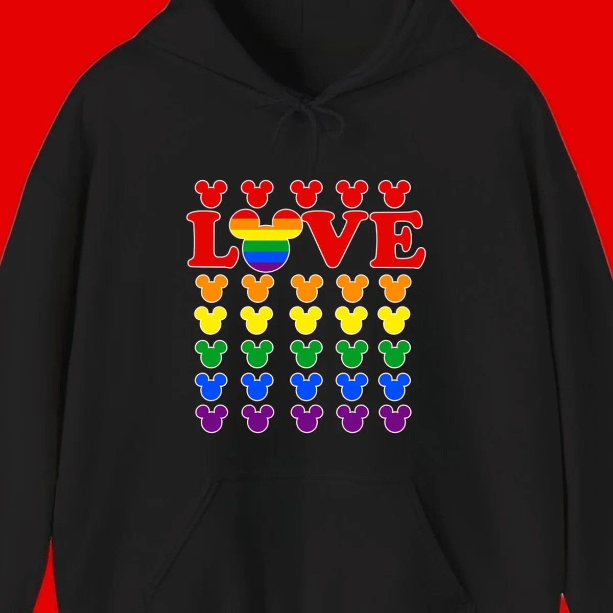 Mickey Love Pride design featuring bold red LOVE text with rainbow-striped Mickey head and colorful Mickey silhouettes border