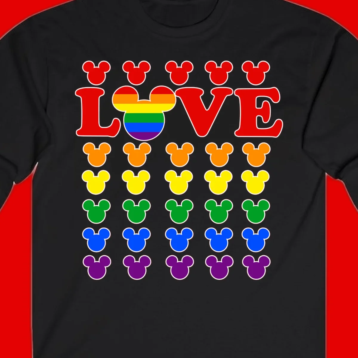 Mickey Love Pride design featuring bold red LOVE text with rainbow-striped Mickey head and colorful Mickey silhouettes border