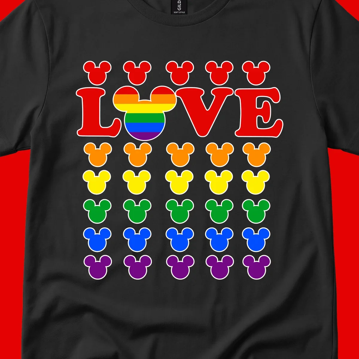 Mickey Love Pride design featuring bold red LOVE text with rainbow-striped Mickey head and colorful Mickey silhouettes border