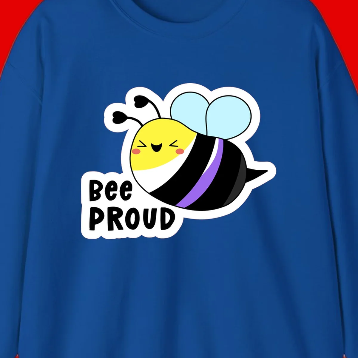 Cartoon bee with yellow head, purple-striped black body, and blue wings smiling happily with text 'BEE PROUD' below