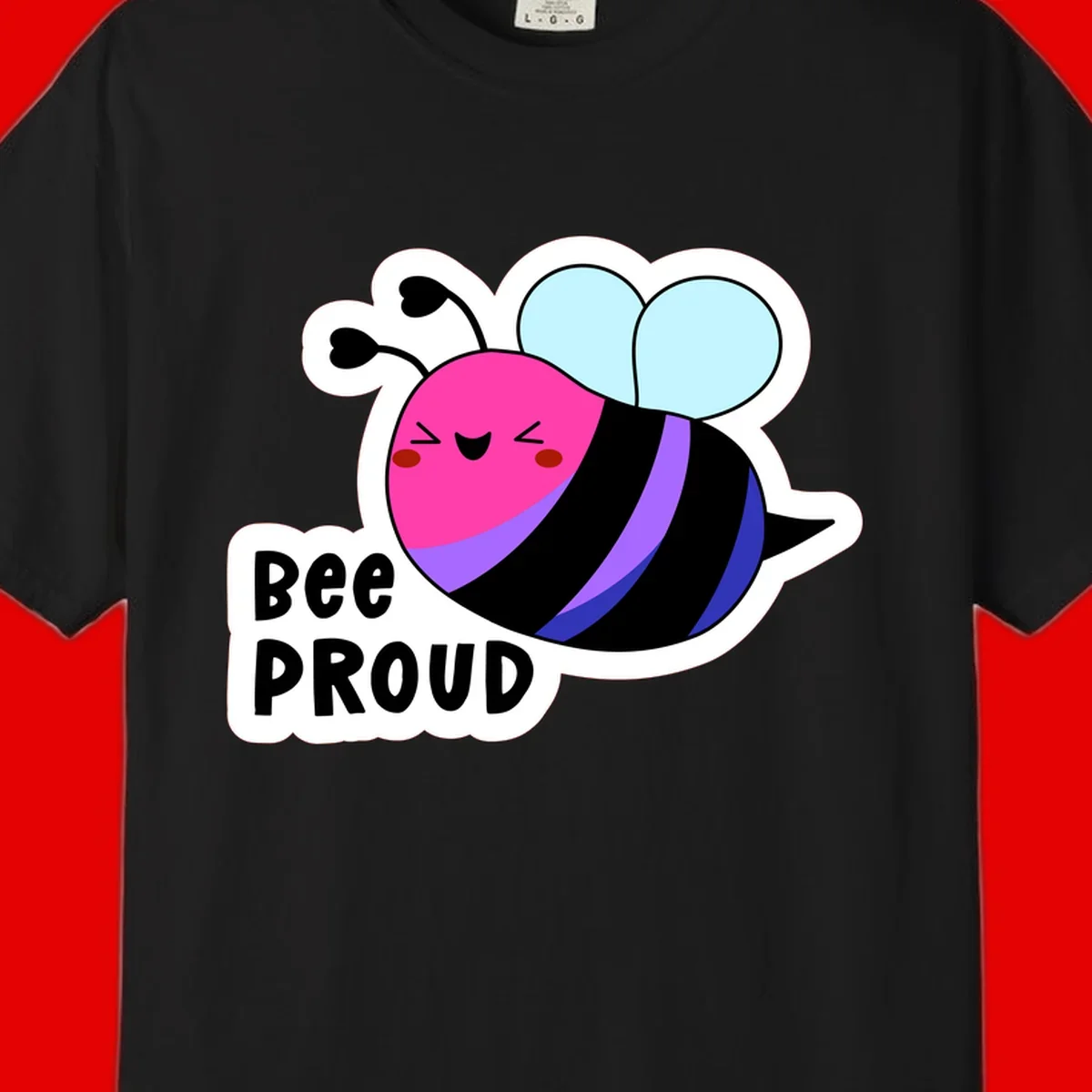 Colorful cartoon bee with pink head, rainbow-striped body, light blue wings, smiling face, and 'BEE PROUD' text