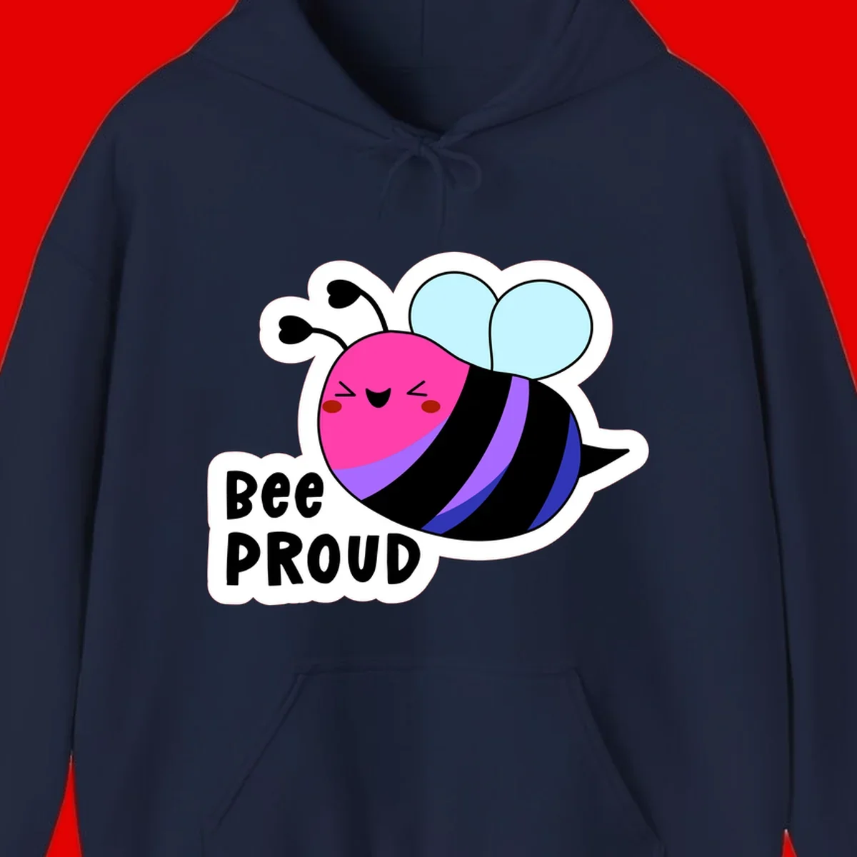 Colorful cartoon bee with pink head, rainbow-striped body, light blue wings, smiling face, and 'BEE PROUD' text